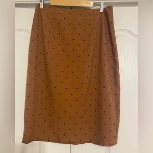 Dainty Jewell’s polka dot skirt